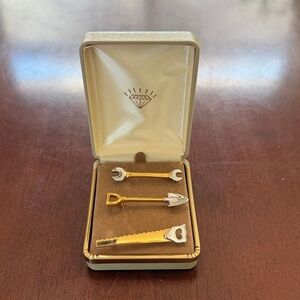 Gold and Silver Tool-Themed pins